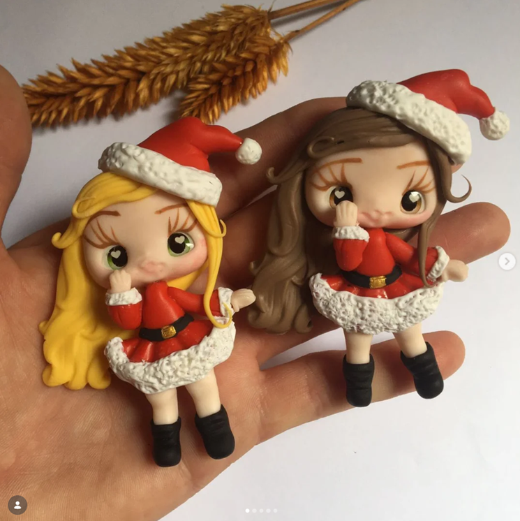 Duas bonecas de Natal em biscuit