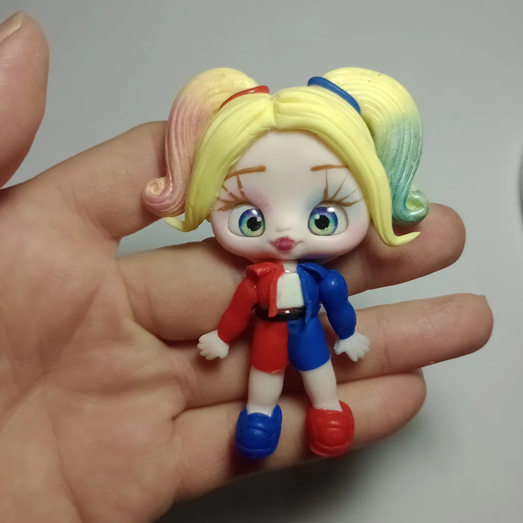 Boneca Arlequina coleção
